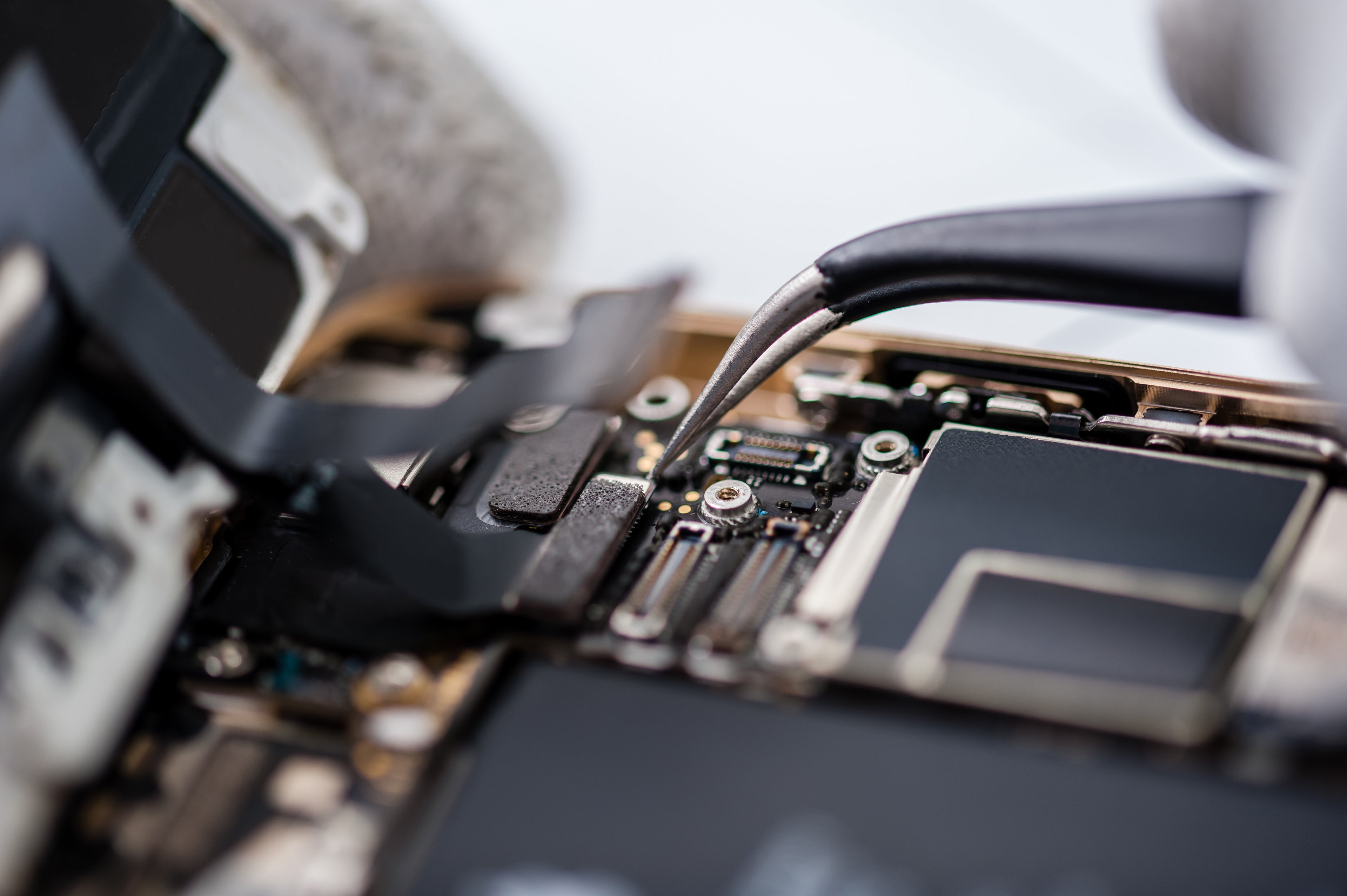 Precision smartphone camera relocation and hardware modification process