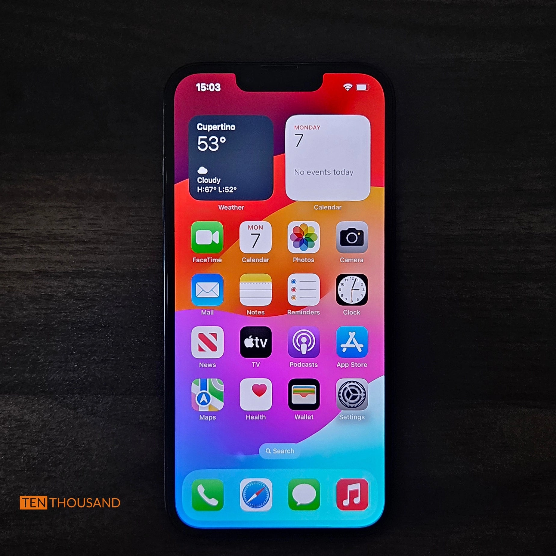 iPhone 14 hidden camera phone with screen turned on showing normal iOS interface