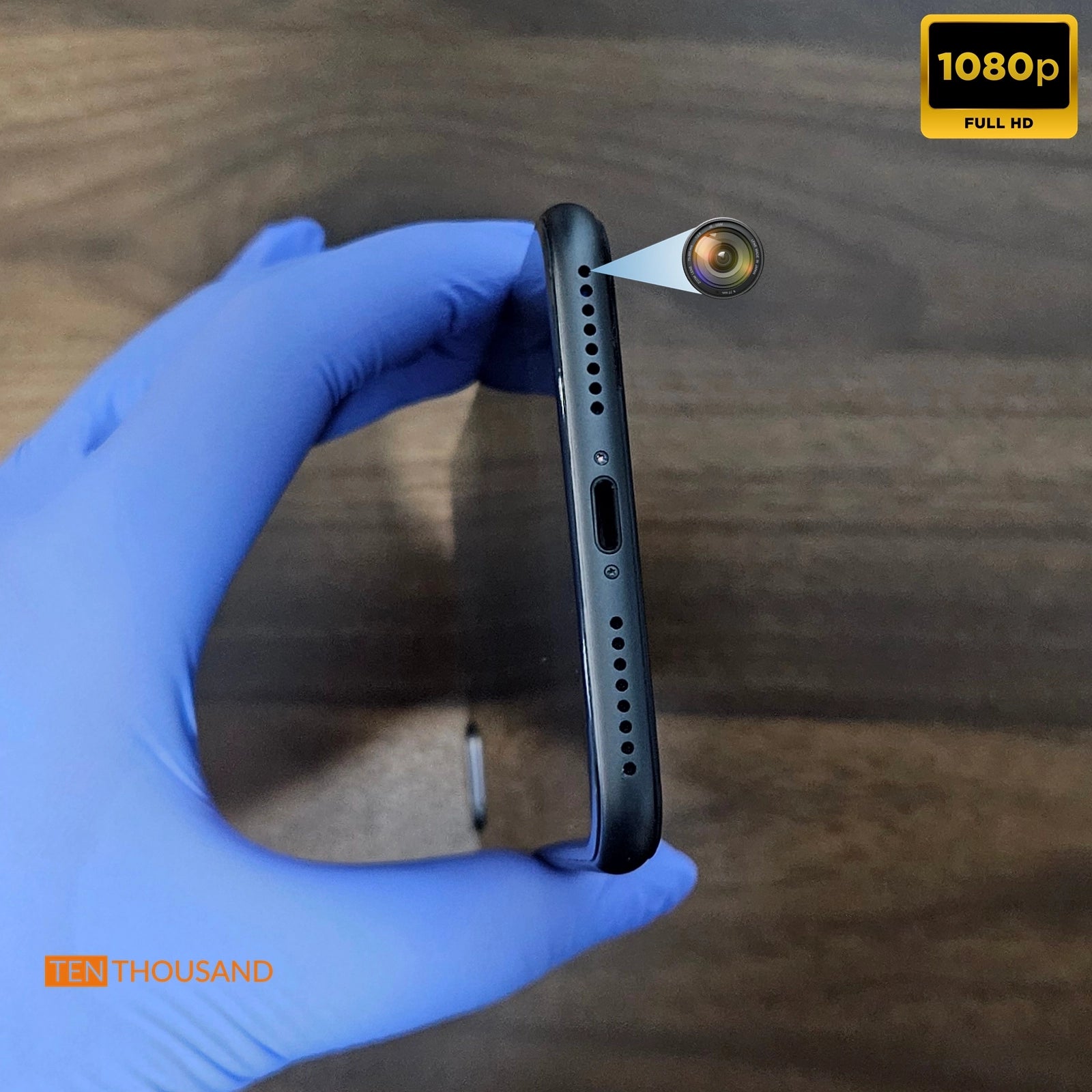 Close-up view of iPhone 8 Plus with front camera relocated to the bottom speaker hole for discreet recording