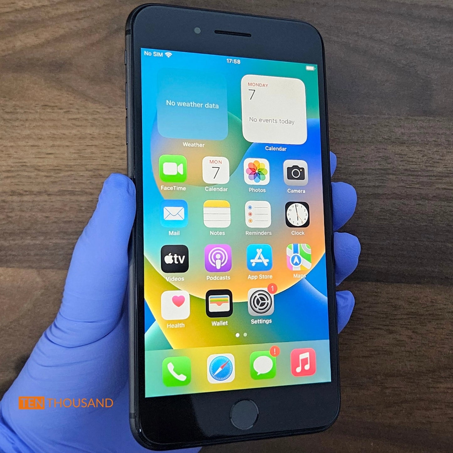 iPhone 8 Plus hidden camera phone with screen turned on showing normal system interface